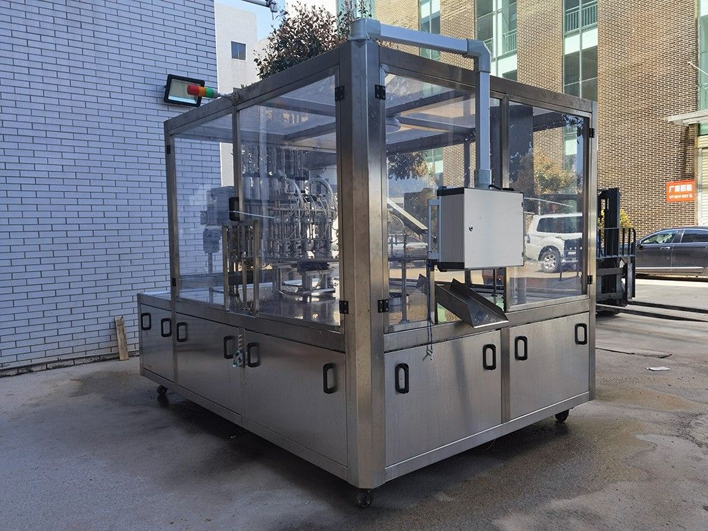 1764832918711738.jpg LG-620 斜嘴袋灌裝旋蓋機(小).jpg